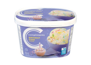 A purple tub of Compliments Birthday Cake Flavour Ice Cream with a photograph of a birthday cupcake with a candle in it on front.
