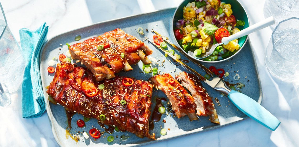 Rectangular aqua blue platter with two racks of sweet and spicy ribs