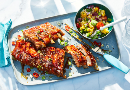 Rectangular aqua blue platter with two racks of sweet and spicy ribs