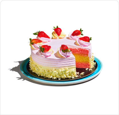 Strawberry-lemonade cake with slice cut out